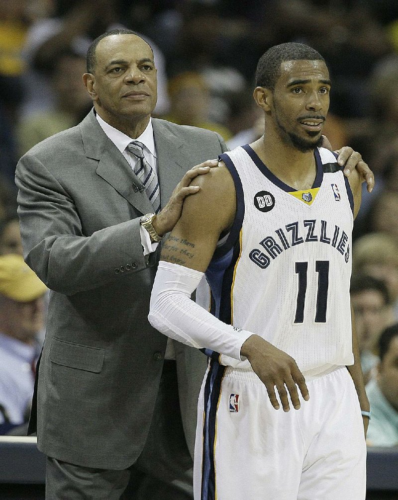 Memphis Grizzlies Coach Lionel Hollins (left) has faced his share of adversity during his career. The Grizzlies trail the San Antonio Spurs 2-0 in the NBA Western Conference finals. 