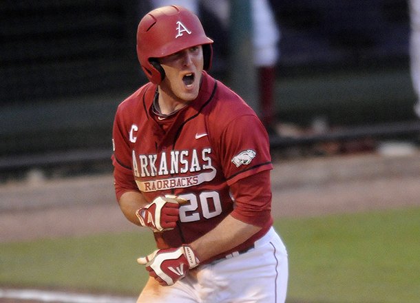 Arkansas baserunner Matt Vinson reacts after scoring the go-ahead run in the eighth inning of Thursday night's 4-1 win over LSU in the SEC baseball tournament in Hoover, Ala. 