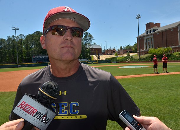 Arkansas coach Dave Van Horn speaks with reporters Friday afternoon after the Razorbacks' practice at Samford University in Birmingham, Ala. 