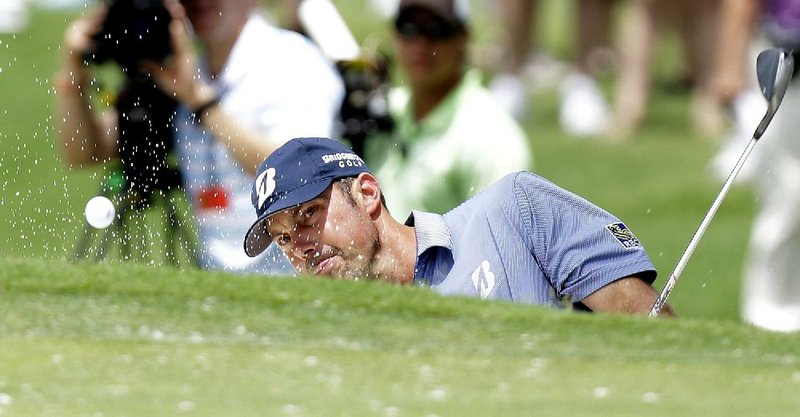 Matt Kuchar watches his tee shot on the second hole during the third round of the Colonial golf tournament Saturday, May 25, 2013, in Fort Worth, Texas.  (AP Photo/LM Otero)