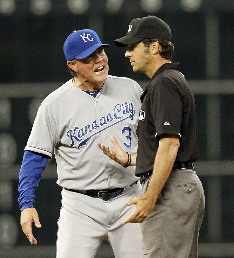 Kansas City Royals Manager Ned Yost (left) was nearly arrested Tuesday for jogging too close to Arrowhead Stadium, where the Kansas City Chiefs were holding a minicamp. 