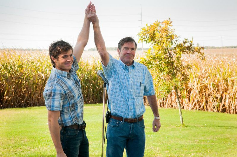 Dean Whipple (Zac Efron) and father Henry (Dennis Quaid) share a brief moment of triumphalism in At Any Price. 
