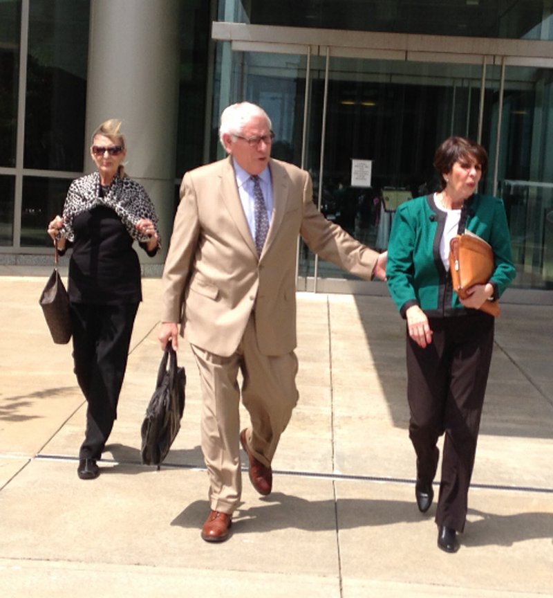 Ex-Treasurer Martha Shoffner leaves the Federal Courthouse after the judge rejected Shoffner's guilty plea Friday afternoon.