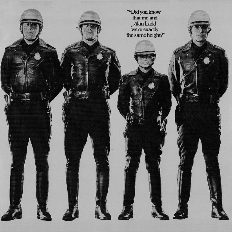 A vintage poster for James William Guercico’s Electra Glide in Blue emphasized the relative diminutiveness of its star, Robert Blake. 