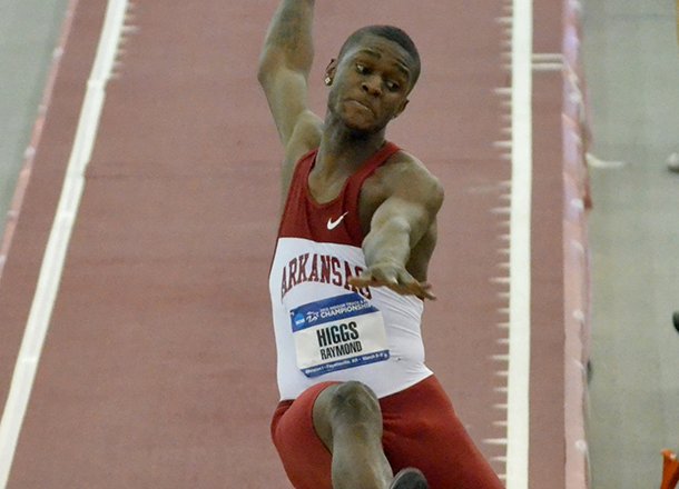 Arkansas long jumper Raymond Higgs makes a jump Friday night, March 8, 2013, during the 2013 NCAA Indoor Track and Field Championships at the Randal Tyson Track Complex in Fayetteville.