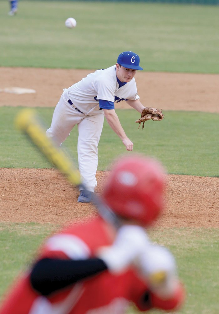 Conway’s Connor Prout pitches to a Fort Smith North batter in a March game at Conway High School.