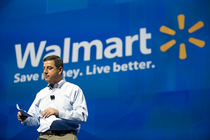 Wal-Mart U.S. Chief Executive Officer Bill Simon speaks to the 6,000 domestic Wal-Mart shareholders at Bud Walton Arena in Fayetteville on Wednesday, June 5, 2013. 