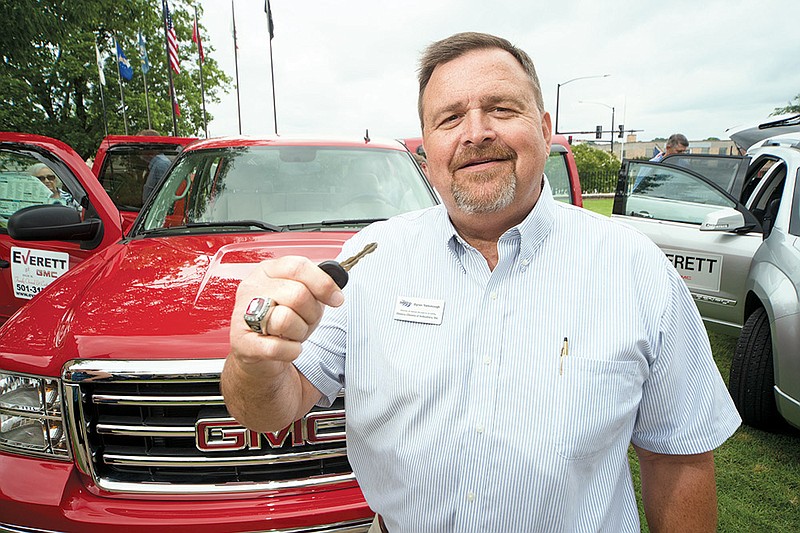 Byron Yarborough received a chance to win a GMC Sierra truck during the upcoming Glitz & Garland fundraising raffle that benefits the Saline Memorial Health Foundation and the Benton Area Chamber of Commerce.