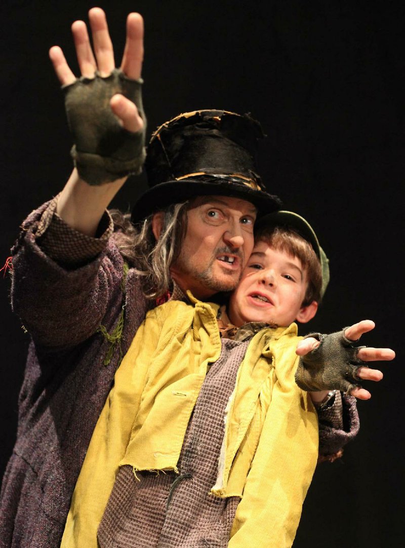 Warren Kelley, as Fagin, and Simon Marotte, as Oliver, star in Arkansas Shakespeare Theatre’s Oliver! 
