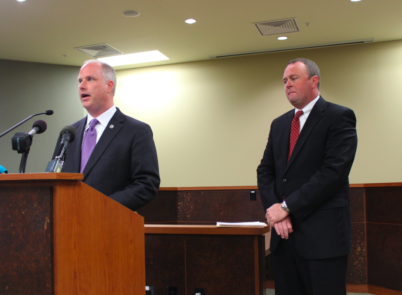 Attorney General Dustin McDaniel speaks at a news conference Thursday beside U.S. Attorney for the Eastern District of Arkansas Chris Thyer.