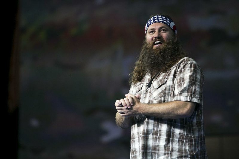 Willie Robertson, chief executive officer of Duck Commander and star of the reality television series Duck Dynasty, talks to Wal-Mart associates at a pre-shareholders meeting recently. 