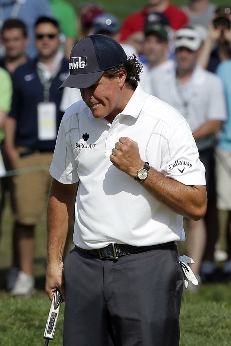 Phil Mickelson came back after bogeys at Nos. 3 and 5 to make birdies at 10, 11 and 17 to hang on to the U.S. Open lead following Saturday’s third round, despite a bogey on 18. He holds a one-shot lead over fellow Americans Hunter Mahan and Steve Stricker and Charl Schwartzel of South Africa. 
