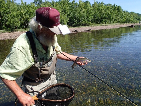 Bryce Cadion shows one of five rainbow trout he caught in the One Fly tournament. 