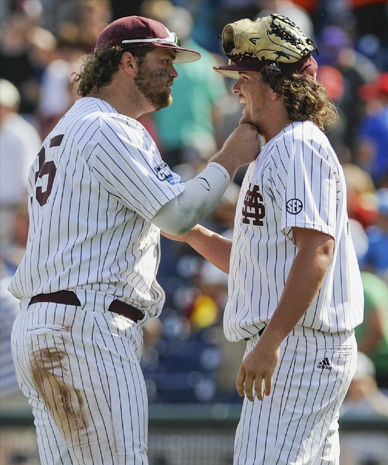 Mississippi State first baseman Wes Rea (left) and reliever Jonathan Holder look to be part of the Bulldogs’ first College World Series championship team. 