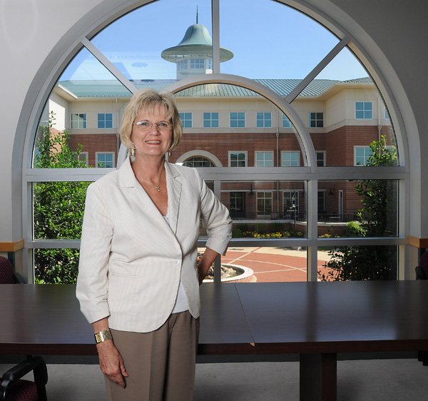 Becky Paneitz, president of NorthWest Arkansas Community College, is photographed in front of the student center June 12 at NWACC in Bentonville. Paneitz will retire at the end of the month. The student center was named after Paneitz in the June 10 Board of Trustees meeting. 