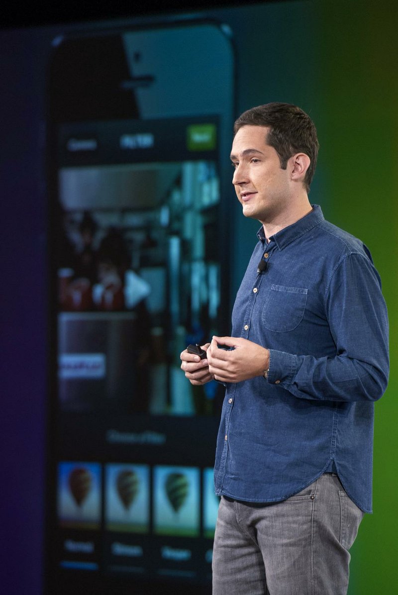 Kevin Systrom, chief executive officer and co-founder of Instagram Inc., speaks during an event at the Facebook Inc. headquarters in Menlo Park, California, U.S., on Thursday, June 20, 2013. Facebook Inc., operator of the largest social network, plans to unveil video-sharing tools, bringing its Instagram into closer competition with Twitter Inc., a person with knowledge of the matter said. Photographer: David Paul Morris/Bloomberg*** Local Caption *** Kevin Systrom