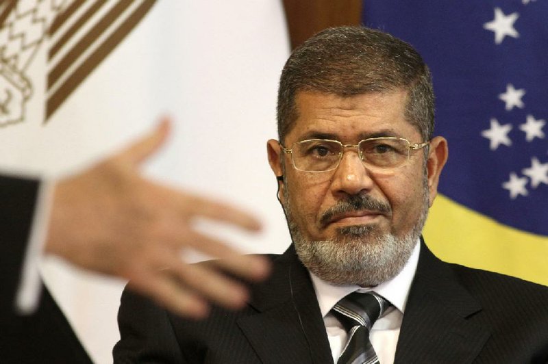 The opposition argues that  Egyptian President Mohammed Morsi (shown) and his Muslim Brotherhood, despite having won a series of elections since the 2011 revolution that ousted autocrat Hosni Mubarak, have squandered their legitimacy with heavy-handed misrule.