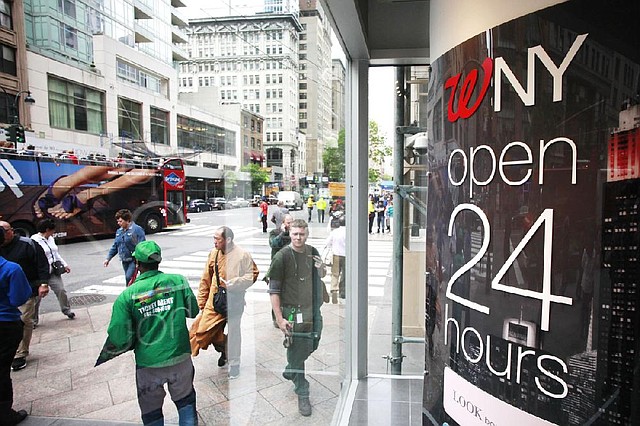 The flagship Walgreens store in the Empire State Building in New York is seen in May. A measure of consumer confidence rose in June to the best reading since January 2008. 