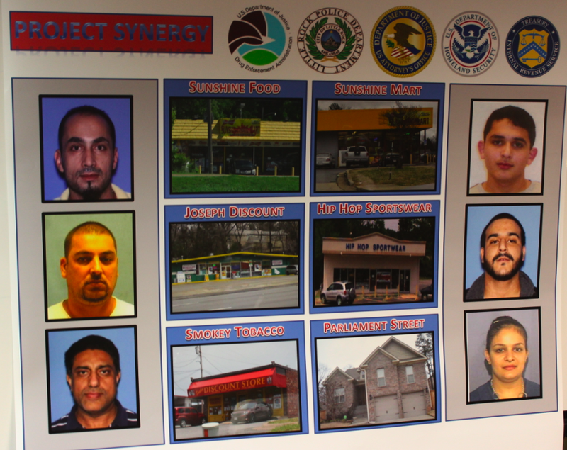 This poster at a news conference shows the six suspects charged and six locations searched as part of a federal probe into synthetic drug sales in Little Rock. Counterclockwise from top left: Amjad Kattom, Yousef Qattoum, Abdul Aziz Farishta, Adam Kattoum, Eassa Rawashdeh and Sahar Kattom.