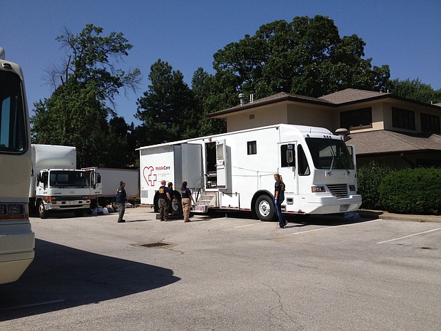 FBI agents searched a cancer research facility Thursday in Rogers.