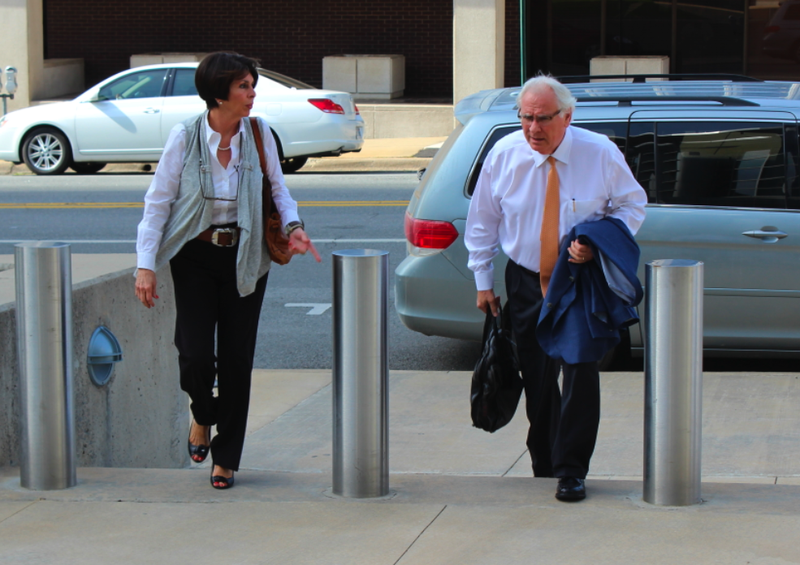 Former treasurer Martha Shoffner and her attorney, Chuck Banks, arrive to U.S. District Court in Little Rock Thursday morning.