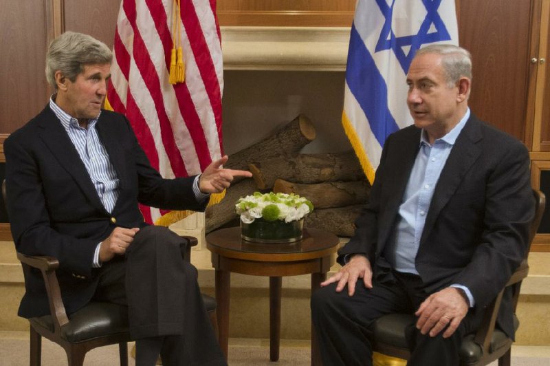 U.S. Secretary of State John Kerry, left, meets with Israeli Prime Minister Benjamin Netanyahu in Jerusalem on Thursday, June 27, 2013. Kerry was in Israel for the fifth time to make further efforts to resume peace talks between Israel and the Palestinians. (AP Photo/Jacquelyn Martin, Pool)