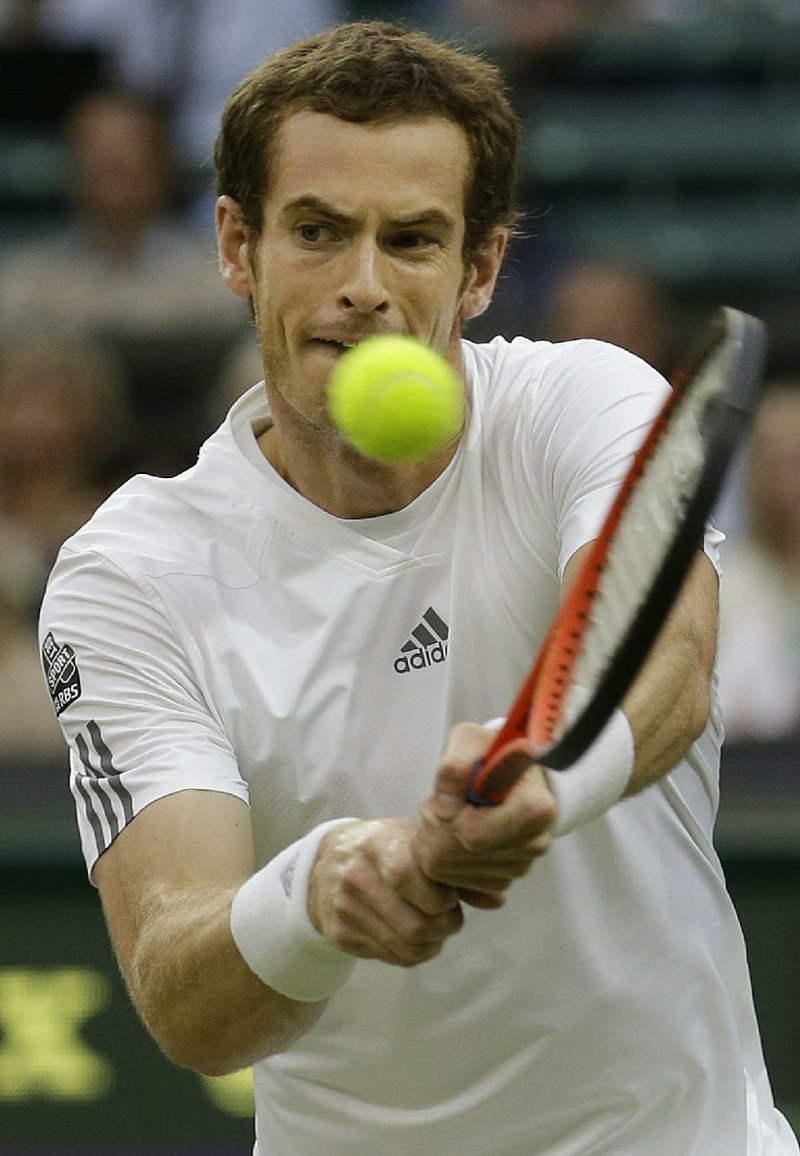 Andy Murray of Britain returns to Tommy Robredo of Spain in their Men's singles match at the All England Lawn Tennis Championships in Wimbledon, London, Friday, June 28, 2013. (AP Photo/Anja Niedringhaus) 