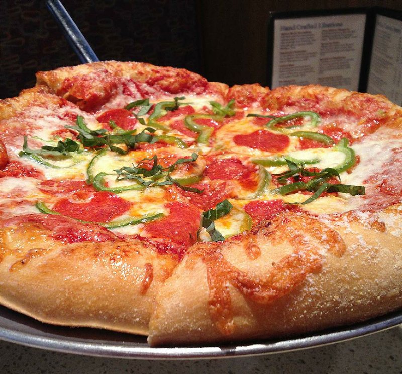 You can build your own pizza — in this case, a medium pepperoni, fresh basil and green pepper pie — at Mellow Mushroom, 16103 Chenal Parkway, Little Rock. 
