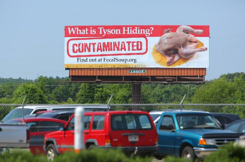 This billboard that went up Wednesday near Bill and Hillary Clinton National Airport/Adams Field targets Tyson Foods Inc. and the poultry industry in general for what critics claim are unsanitary and unsafe food-production practices. 