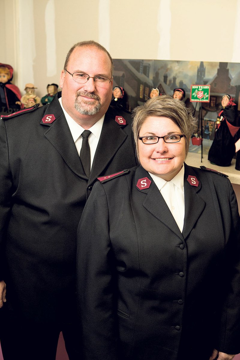Capts. David and Joanna Robinson, corps officers for The Salvation Army in Conway, stand in Joanna’s office, where she has a collection of Byers’ Choice carolers. Her grandmother, who died in 1999, was a member of The Salvation Army for 50 years.