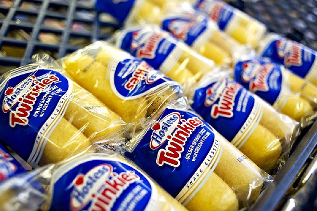 Hostess Brands Inc. Twinkies snacks sit on a shelf inside the company's outlet store in Peoria, Illinois, U.S., on Friday, Nov. 16, 2012. Hostess Brands Inc., the bankrupt maker of Wonder bread and Twinkies, said it will fire more than 18,000 workers and liquidate after a nationwide strike by bakery workers crippled operations. Photographer: Daniel Acker/Bloomberg