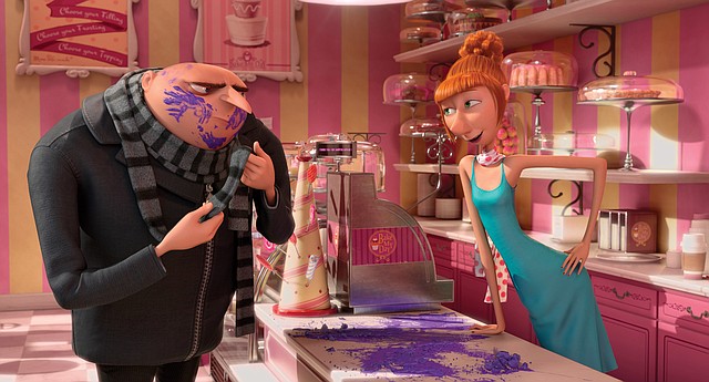 Gru (Steve Carell) tries to work with his new partner Lucy (Kristen Wiig) in Despicable Me 2. The fi lm beat The Lone Ranger to take the top spot at last weekend’s box office and made more than $143 million in five days. 