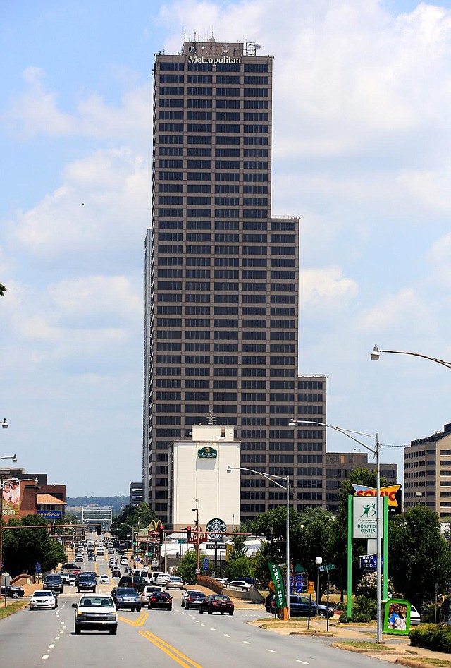 Traffic passes 40-story Metropolitan National Bank in downtown Little Rock on Thursday. The bank’s headquarters is in the building at 425 W. Capitol Ave. 