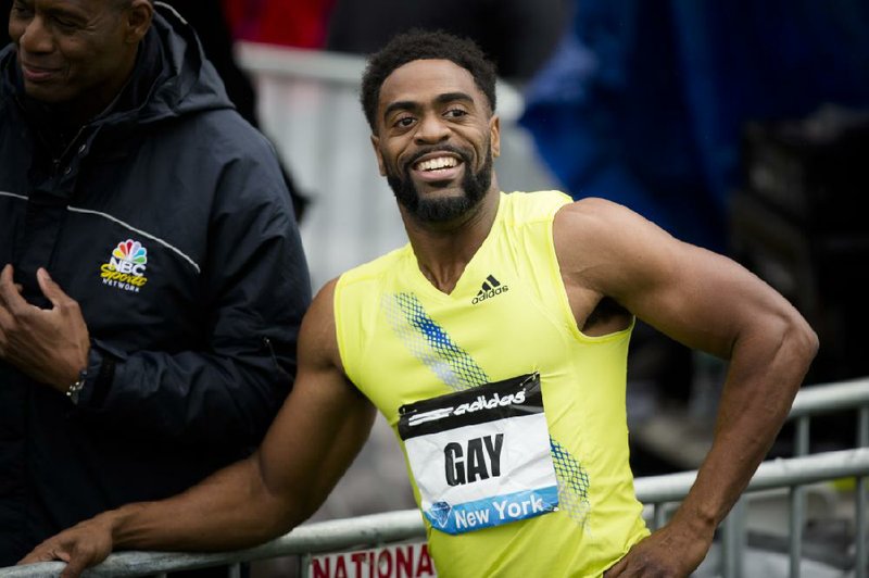 FILE - In a May 25, 2013, file photo Tyson Gay reacts after winning the Men's 100m during the IAAF Diamond League Grand Prix competition in New York. Gay was informed Friday July 12, 2013, he has tested positive for a banned substance and says he will pull out of the world championships next month in Moscow. (AP Photo/John Minchillo/file)