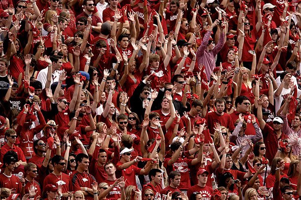 Fans at Donald W. Reynolds Razorback Stadium call the Hogs during a football game Sept. 25, 2010 against Alabama. The attendance was announced at a record-setting 76,808.