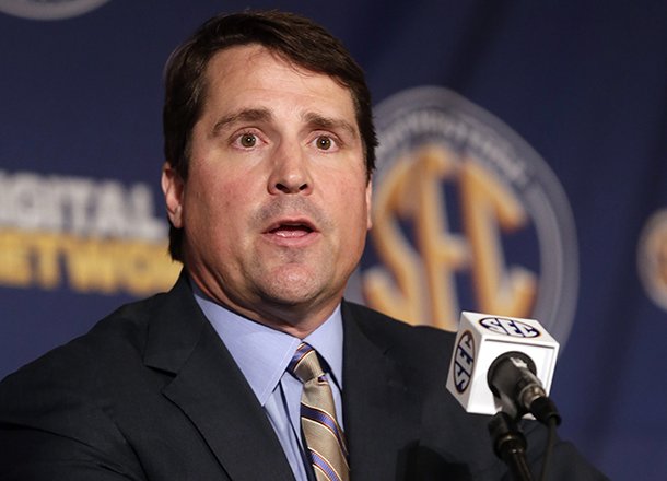 Florida coach Will Muschamp talks with reporters during the SEC football Media Days in Hoover, Ala., Tuesday, July 16, 2013. (AP Photo/Dave Martin)