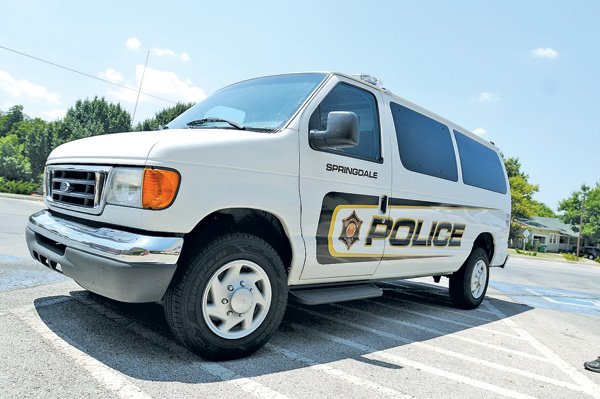 A Springdale police van is used to transport prisoners from the county jails to court in Springdale. 