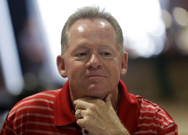 Western Kentucky head football coach Bobby Petrino speaks during an interview at the Sun Belt NCAA college football media day in New Orleans, Monday, July 15, 2013. (AP Photo/Gerald Herbert)