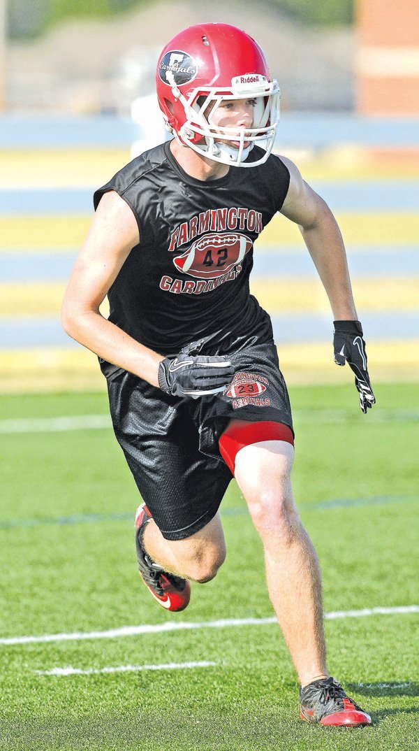 Cory Henry of Farmington runs toward the play Monday at Springdale Har-Ber during the NWA Passing League 7-on-7. 