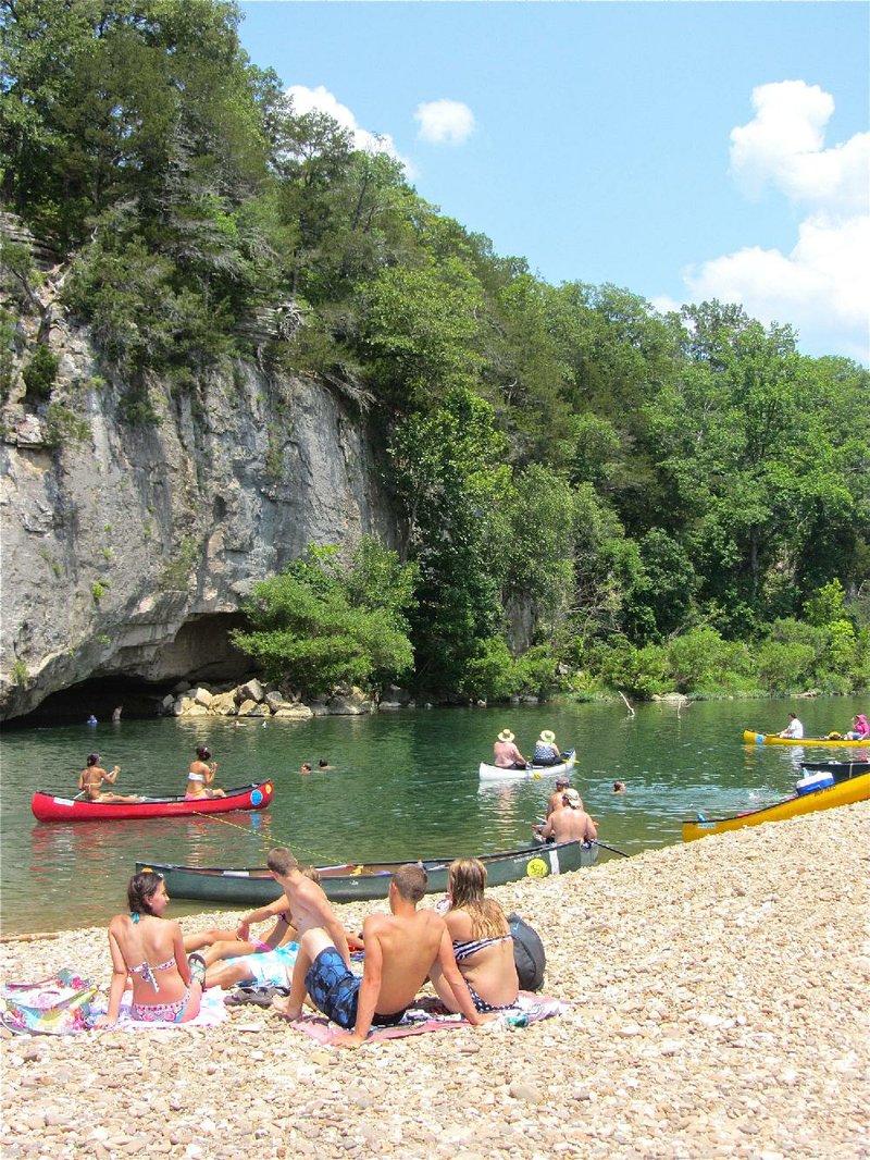 On a hot summer day, the cooling waters of Buffalo National River are a recreational magnet at Grinder Hole. 