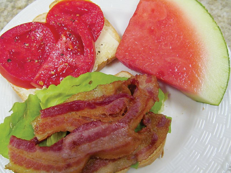 Fresh homegrown tomatoes are a summertime favorite. The classic bacon, lettuce and tomato sandwich is a favorite, too, but ingredients such as avocado, cucumber and spicy mayonnaise can add a twist. Serve the sandwich with another seasonal fave, watermelon, and you have summer on a plate.