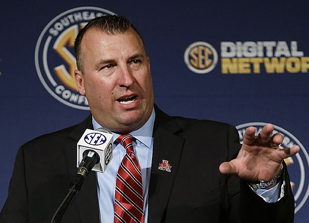 Arkansas coach Bret Bielema talks with reporters during the Southeastern Conference football media days in Hoover, Ala. (AP Photo/Dave Martin, File)