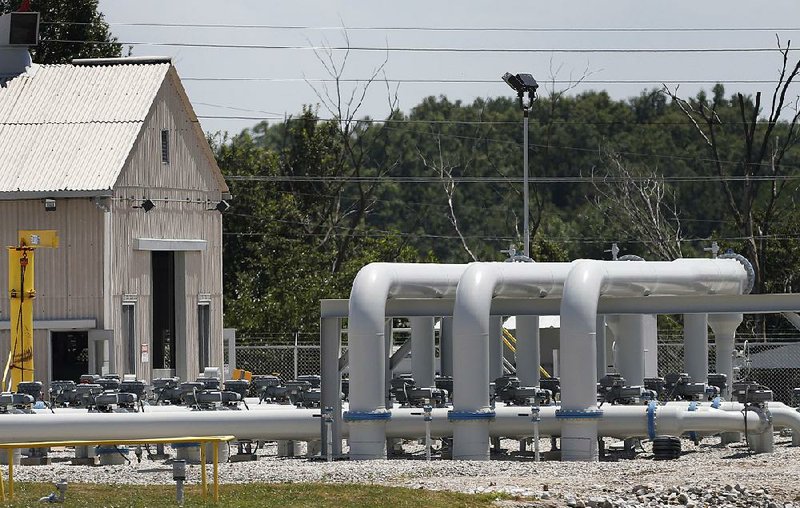 Pipe extends above ground at the Enbridge Key Terminal near Salisbury, Mo., Tuesday, July 16, 2013. The company hopes to begin construction of the Flanagan South pipeline in early August. (AP Photo/Orlin Wagner)