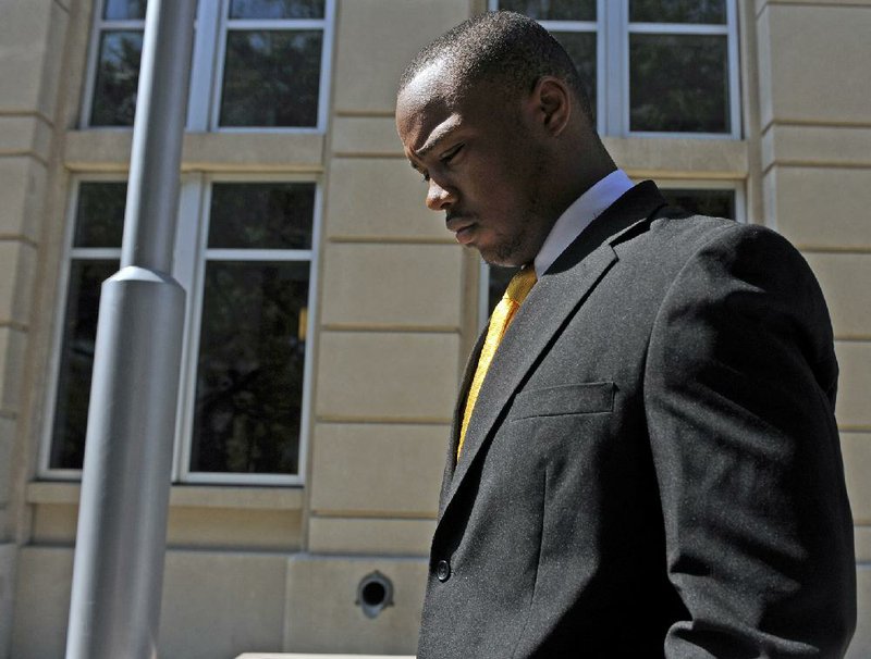 In this file photo, former LSU college football running back Jeremy Hill walks out of arraignment at the 19th Judicial District Courthouse in Baton Rouge, La. The legal problems of current and former SEC players from ex-Florida and NFL tight end Aaron Hernandez to LSUs Jeremy Hill  has cast a negative light on the league that has won seven consecutive national championships. Coaches in the conference say they have to weigh a players talent vs. trouble in or out of the locker room. 