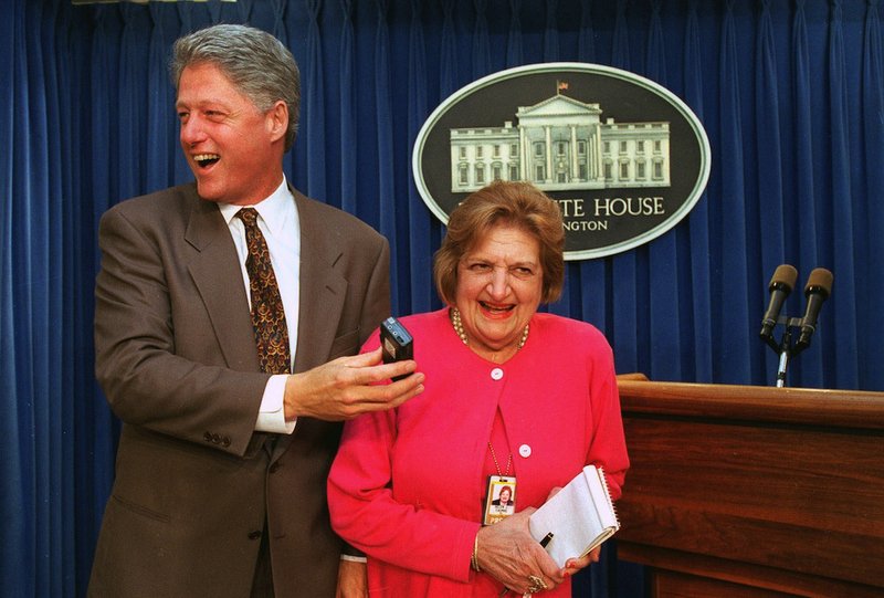 In this Aug. 4, 1995, file photo, President Clinton "interviews" UPI White House correspondent Helen Thomas in the White House briefing room in Washington. Thomas, a pioneer for women in journalism and an irrepressible White House correspondent, has died Saturday, July 20, 2013. She was 92.