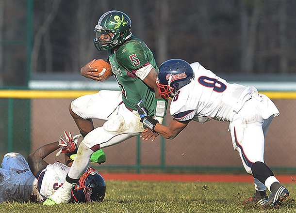 Cedar Creek's Damon Mitchell (5) carries against Willingboro during the first half Dec. 1, 2012. 