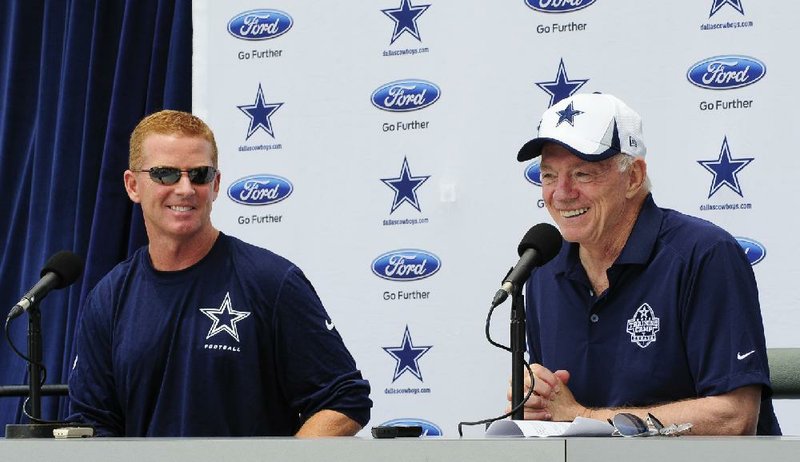 Dallas Cowboys owner Jerry Jones (right) says this is not a makeor-break year for head coach Jason Garrett (left), whose teams have gone 8-8 the past two seasons, missing the playoffs with a loss in the final game of the regular season both times. 