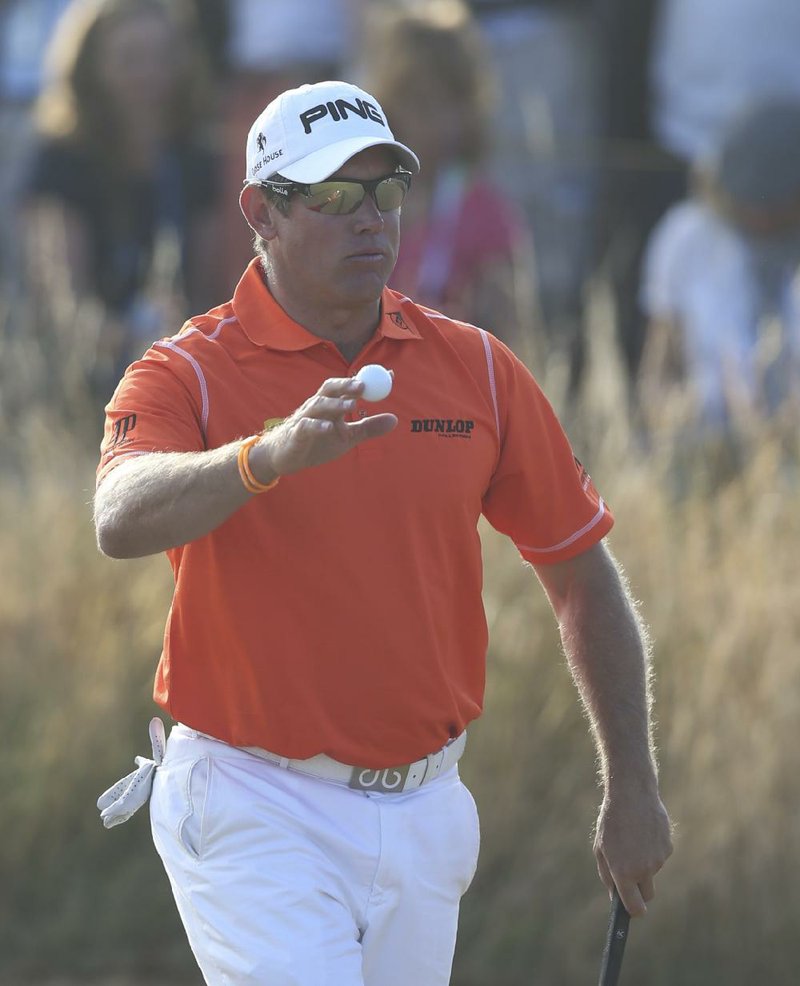Lee Westwood, faced with a ball in the weeds on the 16th hole, salvaged bogey, then picked up two shots on the next hole and holds a two-shot lead heading into today’s final round at the British Open. 