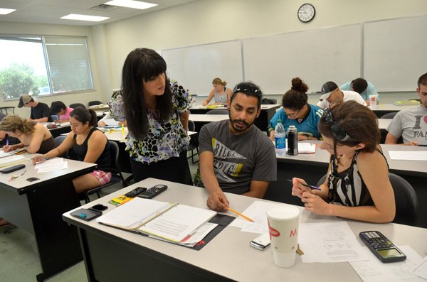 Northwest Arkansas Community College instructor Kerrie Petitt talks with students, Alejandro Cobina and Desiree Snyder as they work out a problem during class Wednesday afternoon at the Washington County Center in Springdale.
NorthWest Arkansas Community College��s plans for a permanent facility in Washington County in the future.