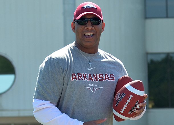 Four of Arkansas receivers coach Michael Smith's recruits from his home state committed to the Hogs in July. He uses his outgoing personality to his advantage.    